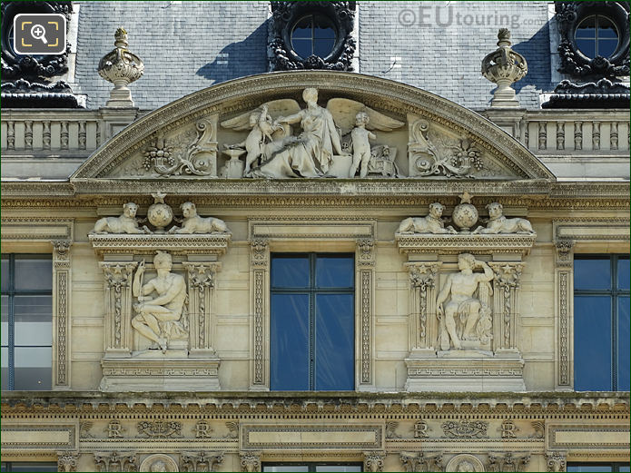 Top of Aile de Marsan 7th window facade with bas relief sculptures
