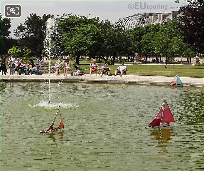 Model sailing boats on pond in Jardin des Tuileries