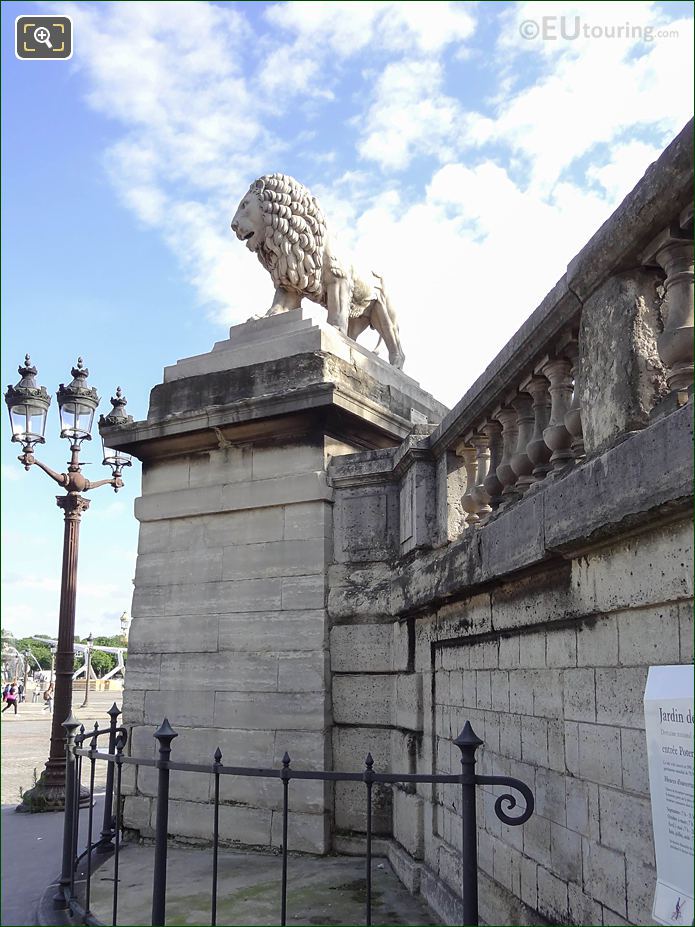 Lion statue on SW corner wall of Jardin des Tuileries