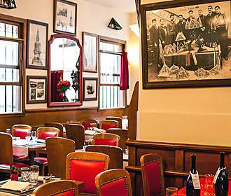 Wall photos inside the Aux Charpentiers Bistro