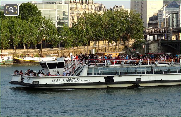 Tourists on Bateaux Mouches open top deck