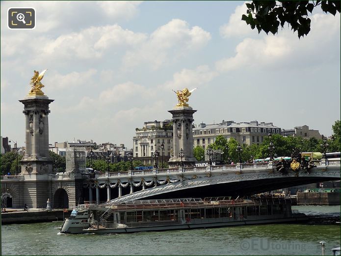 Bateaux Parisiens passing Pont Alexandre III bridge