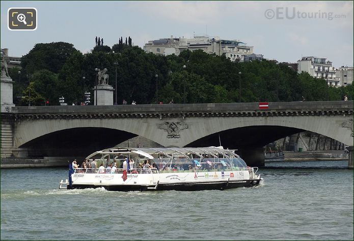 Batobus passing under the Pont d'Iena