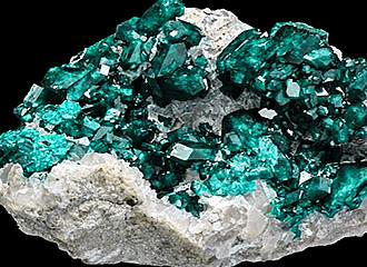 Turquoise mineral crystals inside Galerie de Mineralogie et de Geologie