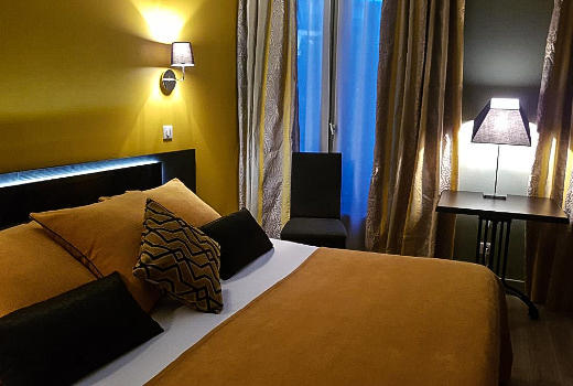 Hotel d'Argenson double bedroom golden orange