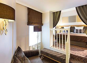 Hotel Galileo bedroom lounge