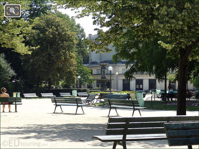 Park benches, fountain and Theatre Marigny