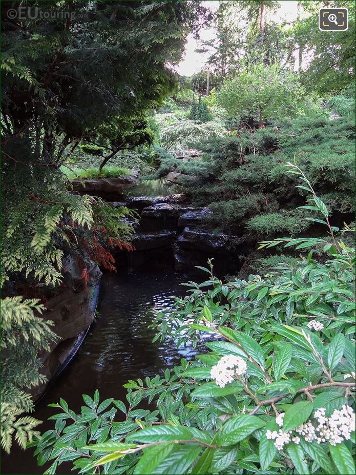 Pond and waterfall inside Jardins du Trocadero looking NW