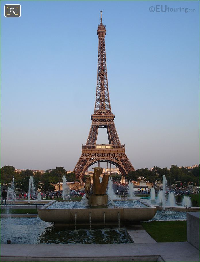 Cascading water basins and fountains at dusk in Jardins du Trocadero