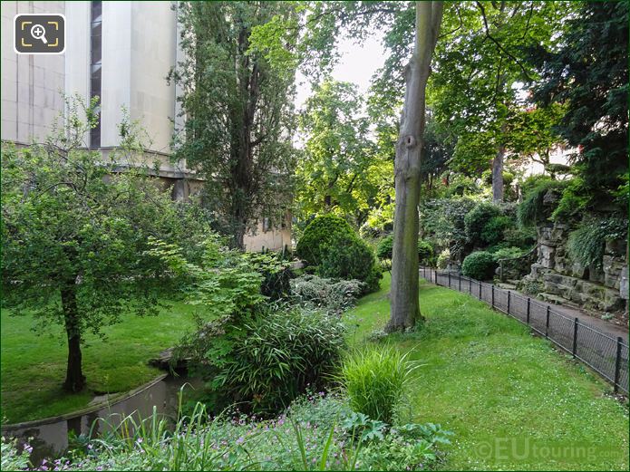 View SE of pond and stream in upper part of Jardins du Trocadero