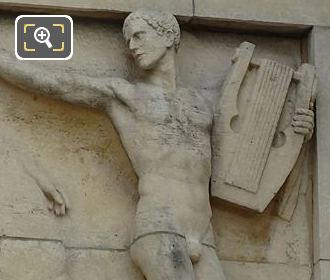 Sculpture of Apollo holding a lyre on SE facade in Jardins du Trocadero