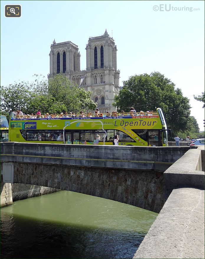 L'OpenTour passing Notre Dame Cathedral in Paris