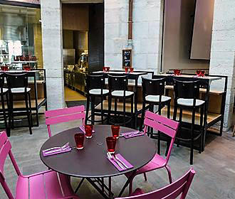 Tables and chairs at La Rotonde de la Villette brasserie