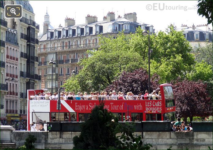 Tourists on Big Bus Paris Les Car Rouges