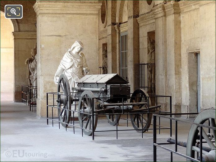 Les Invalides statue and artillery vehicle