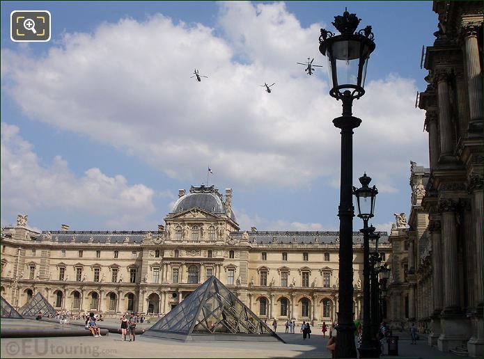 Helicopters flying over Louvre, Paris
