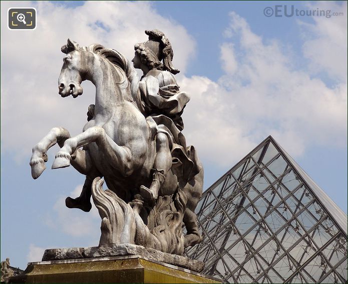 Louvre Museum and the King Louis XIV statue