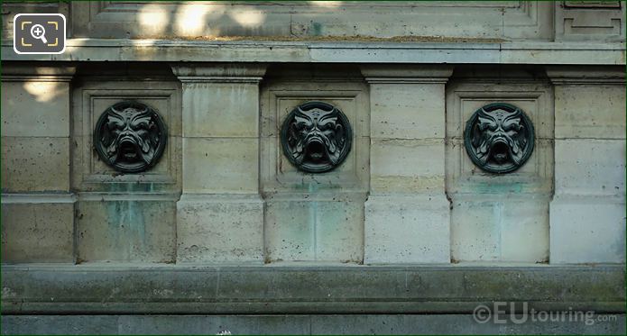 Three Mascarons on Fontaine de Leda