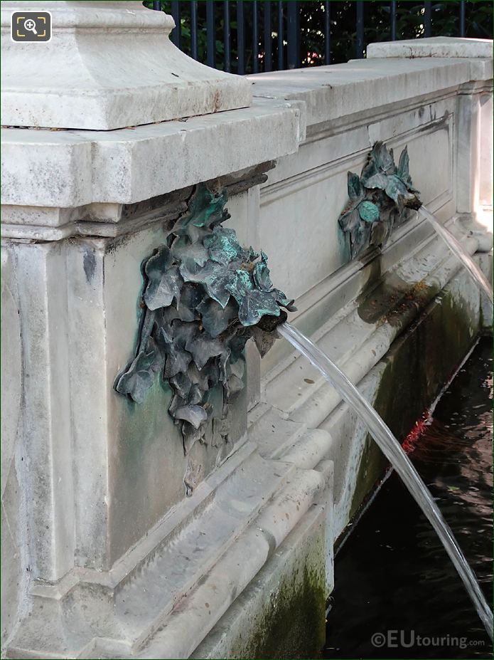 Bronze water spouts on Fontaine Eugene Delacroix Monument fountain