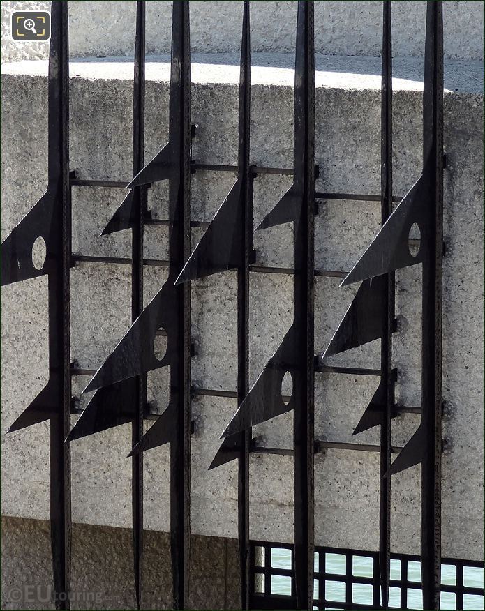 Wrought iron bars with spikes