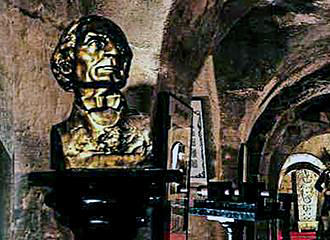 Golden bust of magician inside Musee de la Magie