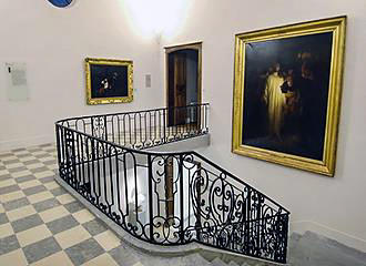 Paintings and staircase at Musee Hebert