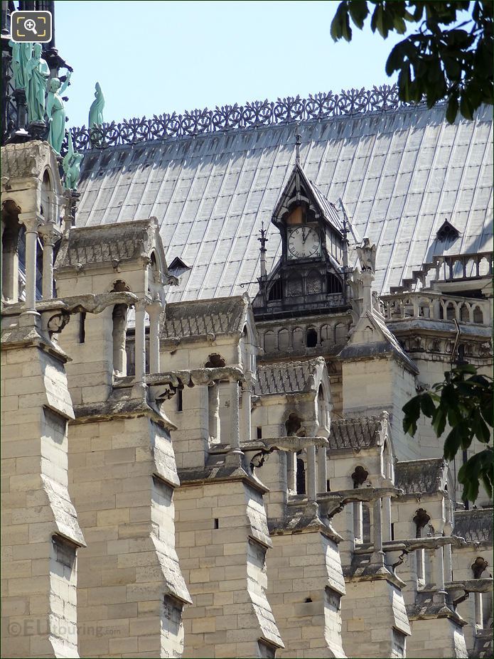 Statues and clock on Notre Dame Cathedral