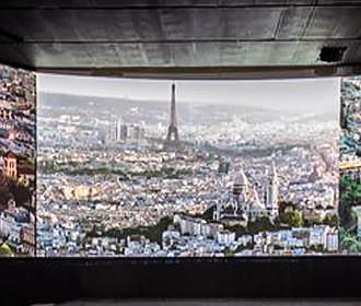 Large screens at Paris-Story