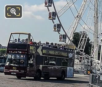 Paris open top bus and ferris wheel