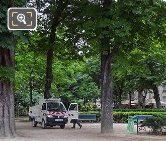 Paris city workers cleaning gardens at Square de Berlin