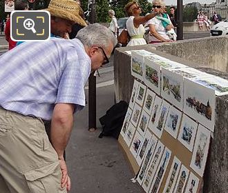 Quai des Tuileries paintings and tourists