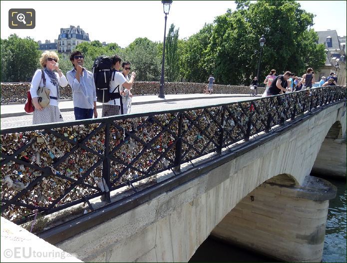 Tourists on Pont de l'Archeveche