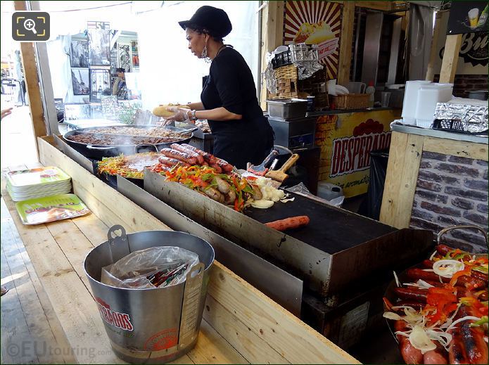 Snack bar worker cooking fast food