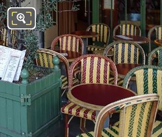 Tables and chairs outside Cafe Le Rostand