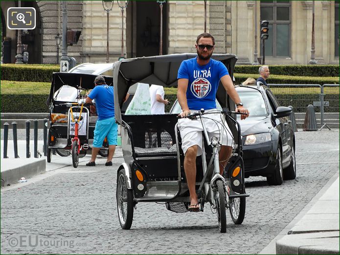 Rickshaw in Place du Carrousel Paris