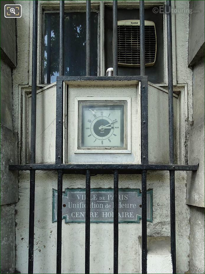 Clock and plaque on West Barriere d'Enfer building