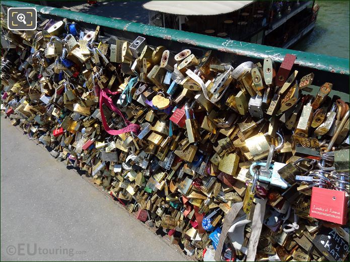 Padlocks on railings of Lovers Bridge Paris