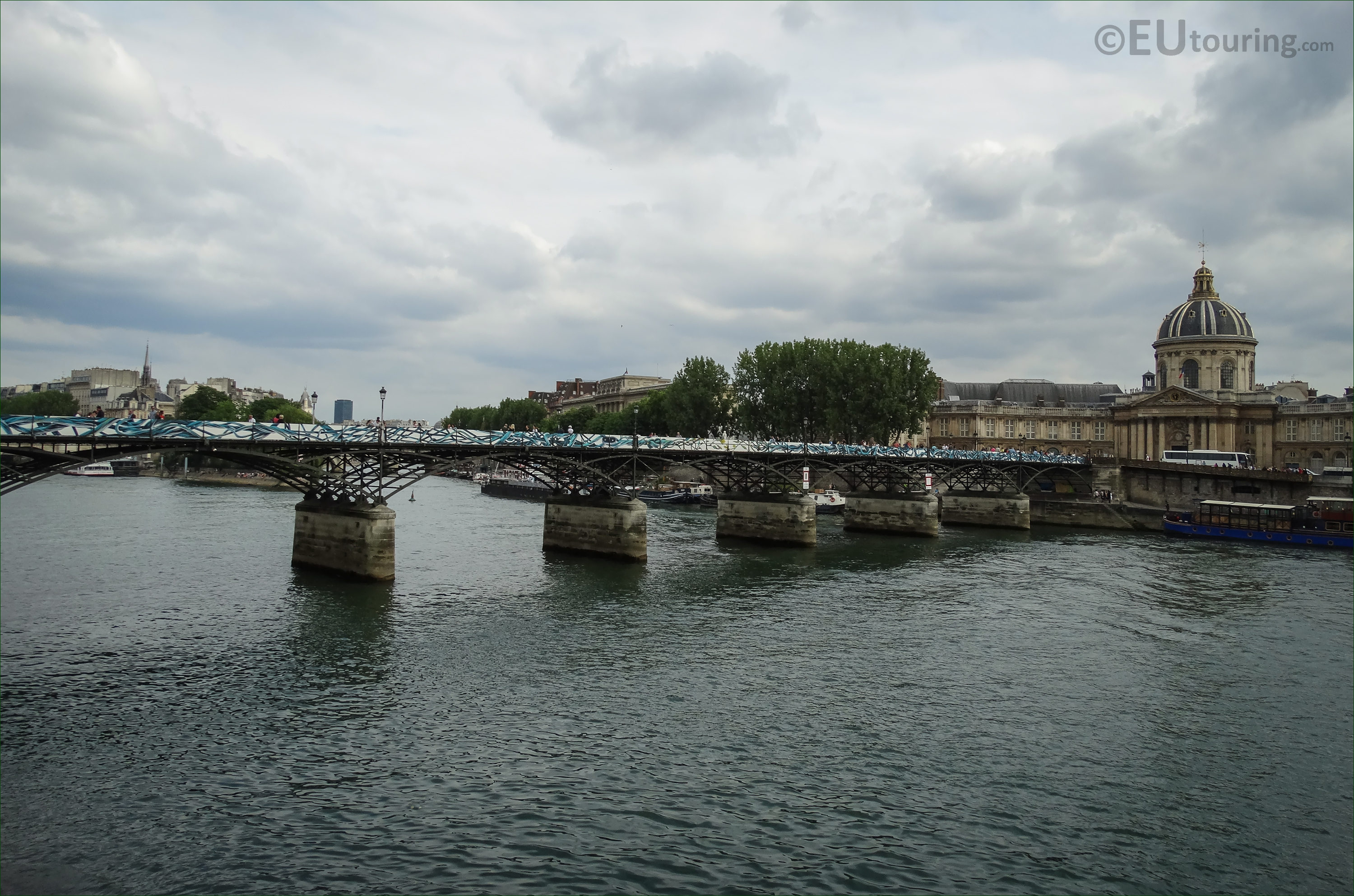 Love Locks On The Pont Des Artes In Paris, France With The Pont Neuf And  Ile De La Cite In The Background Vertical Stock Photo, Picture and Royalty  Free Image. Image 56691282.