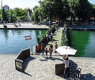 Tourists on the Pont Flottant de la Villette