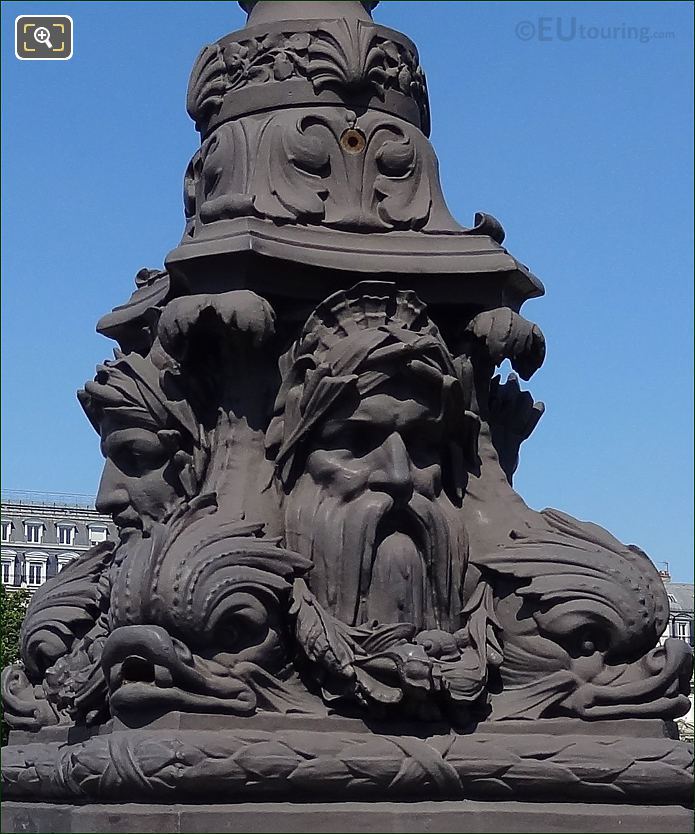 Close up of sculpted faces on Pont Neuf