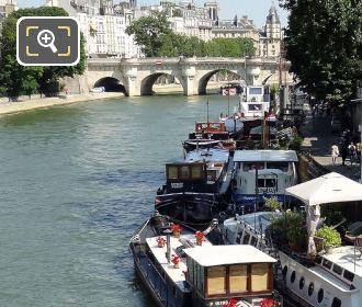 Houseboats moored up near the Pont Neuf bridge