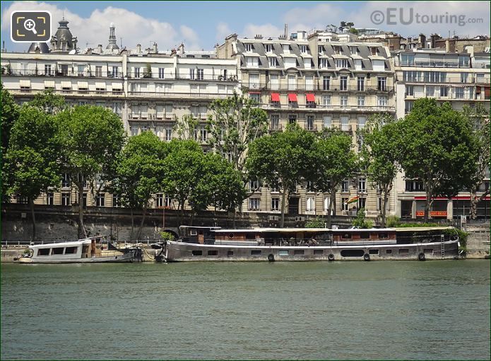 Houseboat moored along Port Debilly