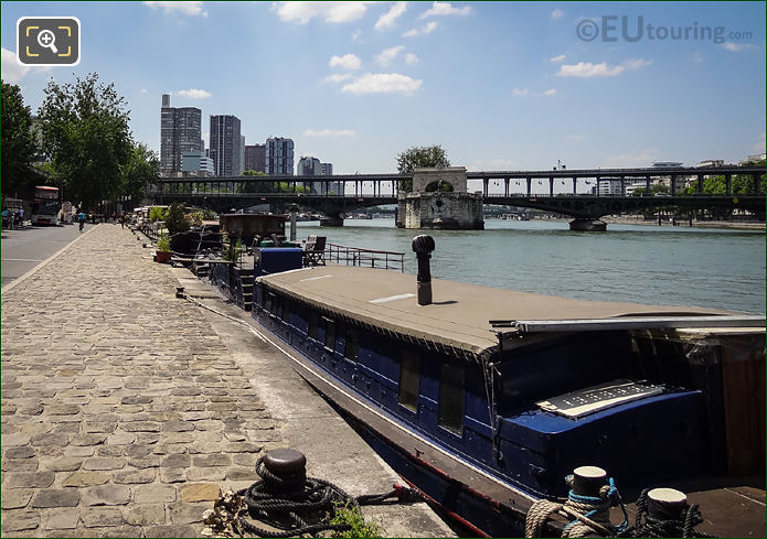 River Seine houseboats and Pont de Bir-Hakeim