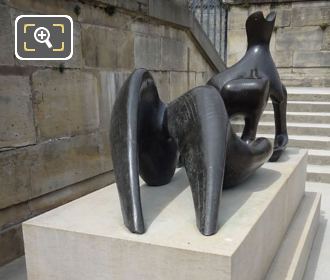 Sculpted feet of the bronze Reclining Figure inside Jardin des Tuileries