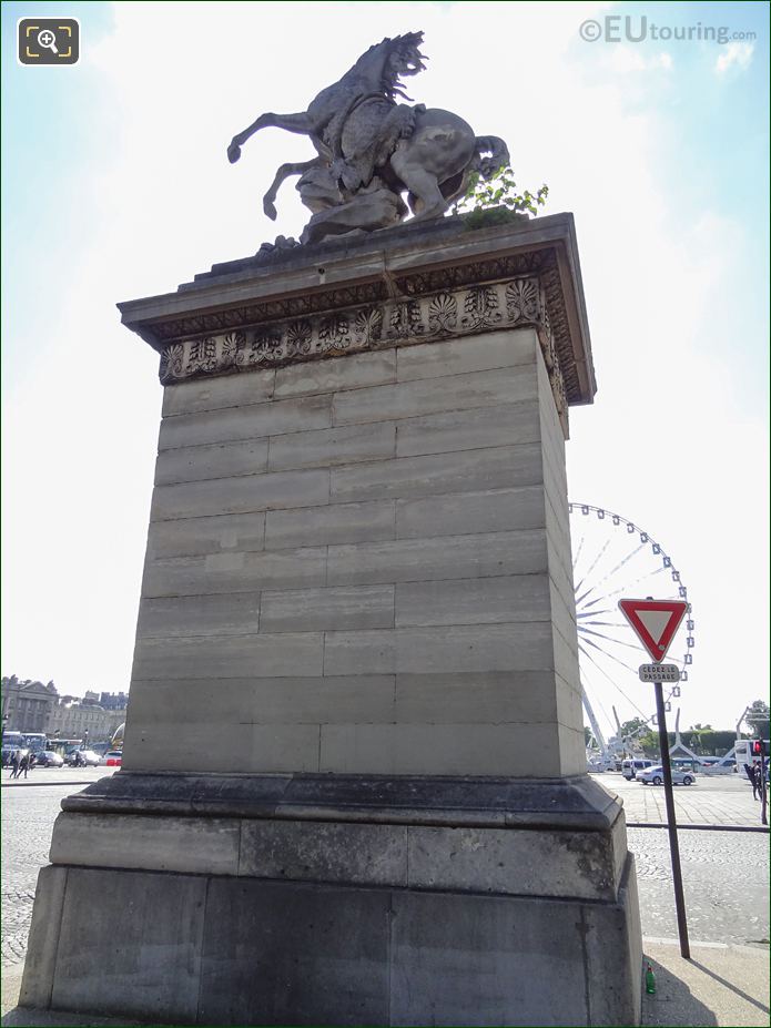 Horse of Marly statue on tall stone pedestal