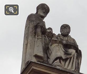 Fathers of the Church statue on pedestal at Eglise Saint-Roch