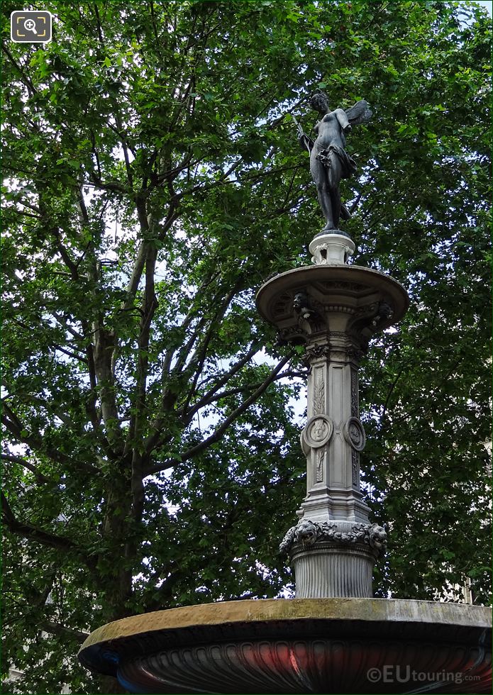 River Nymph statue top of Fontaine du Theatre-Francais Nymphe Fluviale