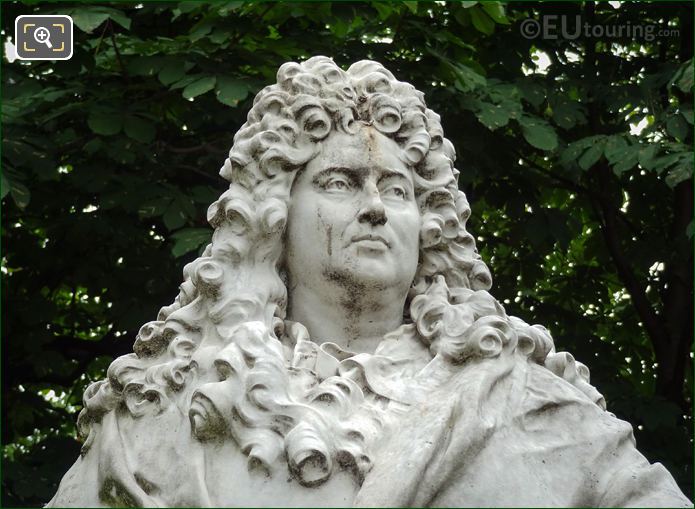 Sculpted face of Charles Perrault on monument