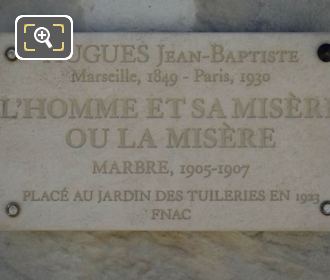 Plaque on L'Homme et sa Misere ou la Misere statue