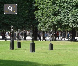 Bronze L'Echiquier statues in Tuileries Gardens